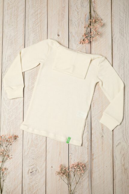 Natural white childrens roll neck top in merino wool